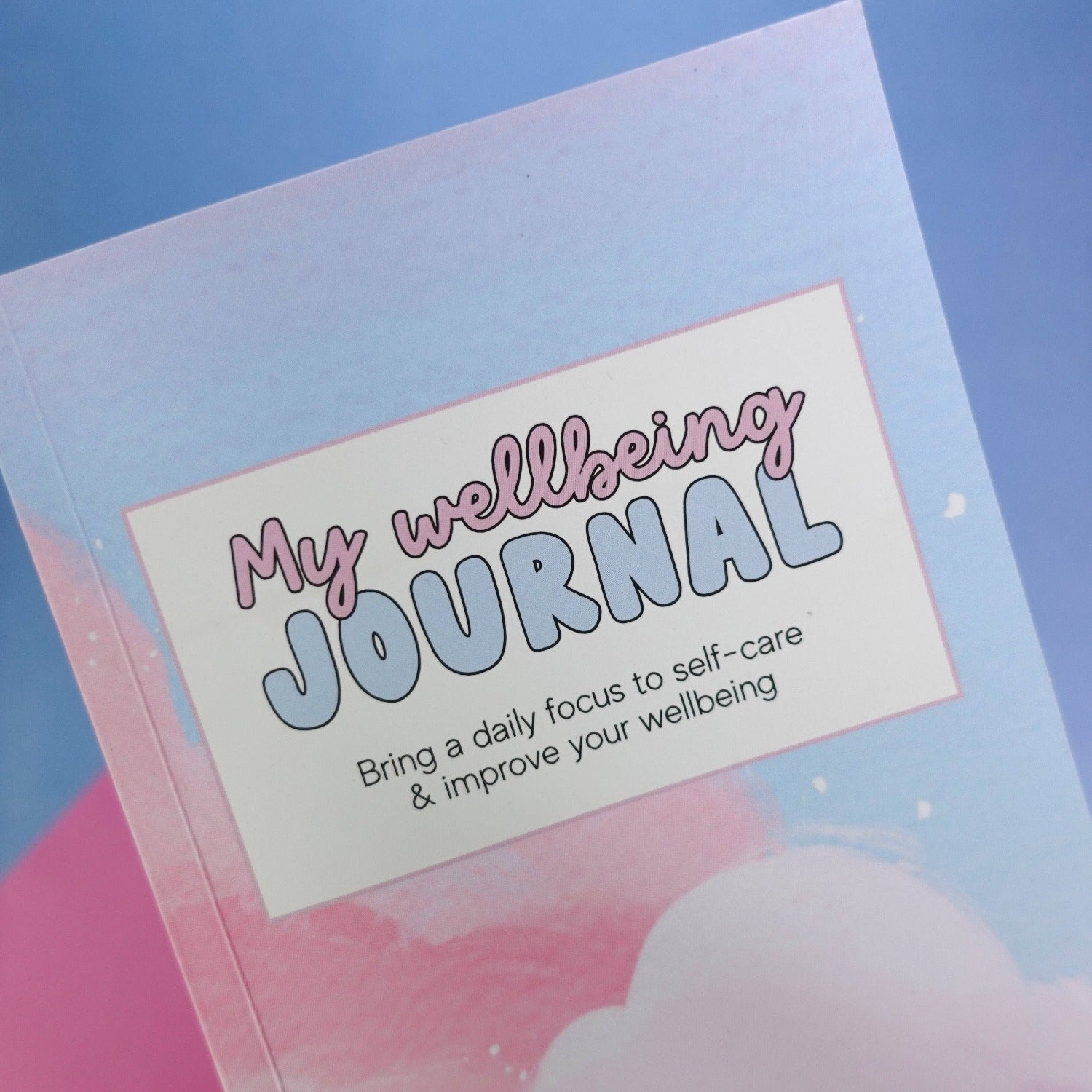 my wellbeing journal in pastel colours