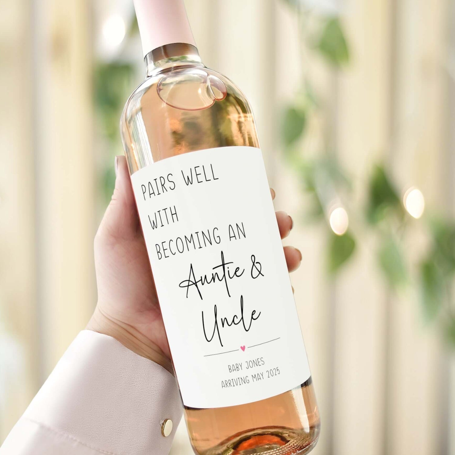 Custom pregnancy reveal wine label reading "Pairs Well with Becoming an Auntie & Uncle," perfect as a thoughtful gift for family.