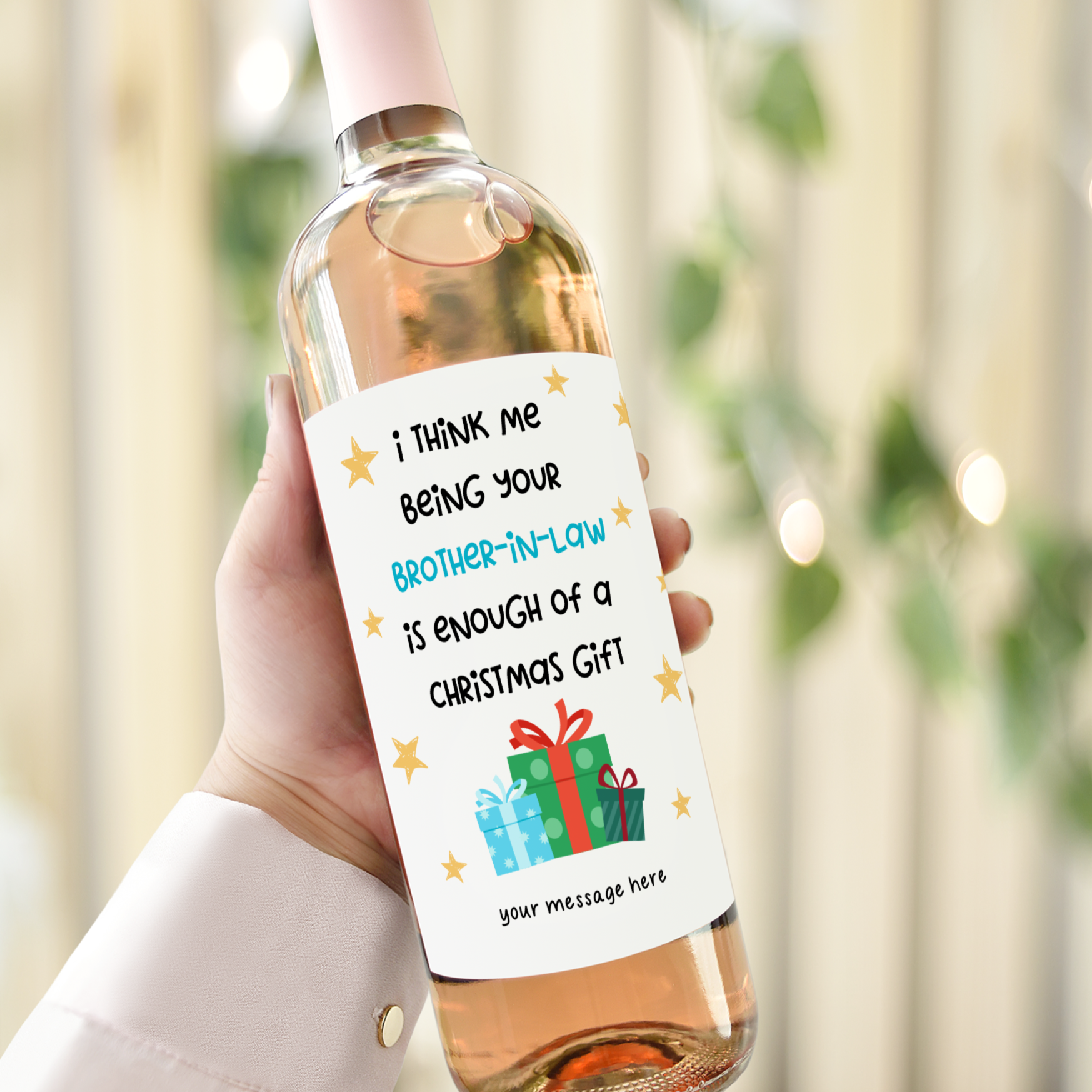 Hand holding a wine bottle with a funny Christmas label for a brother-in-law, featuring stars and gift graphics with a playful holiday message.