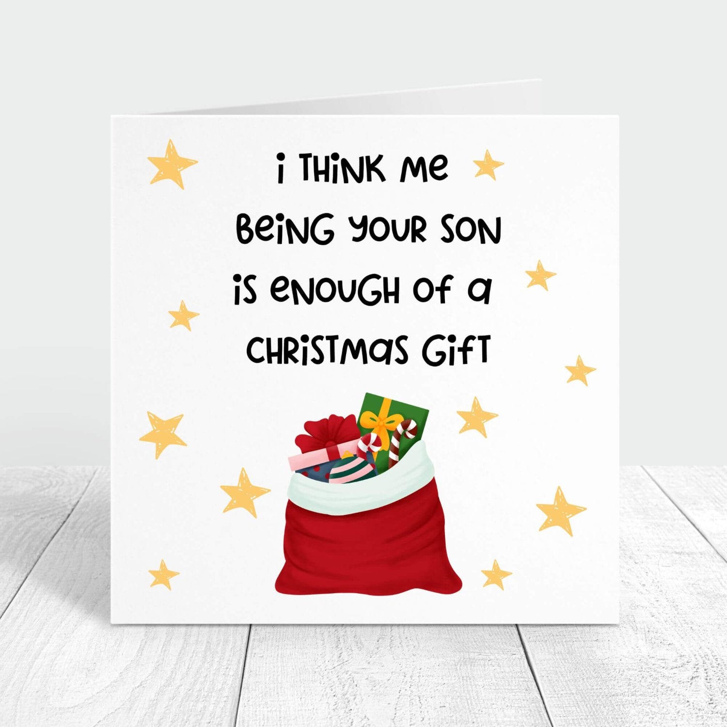 Funny Christmas card with the message "I think me being your son is enough of a Christmas gift," decorated with a Santa sack filled with gifts and golden stars. Perfect for sharing a laugh with parents.