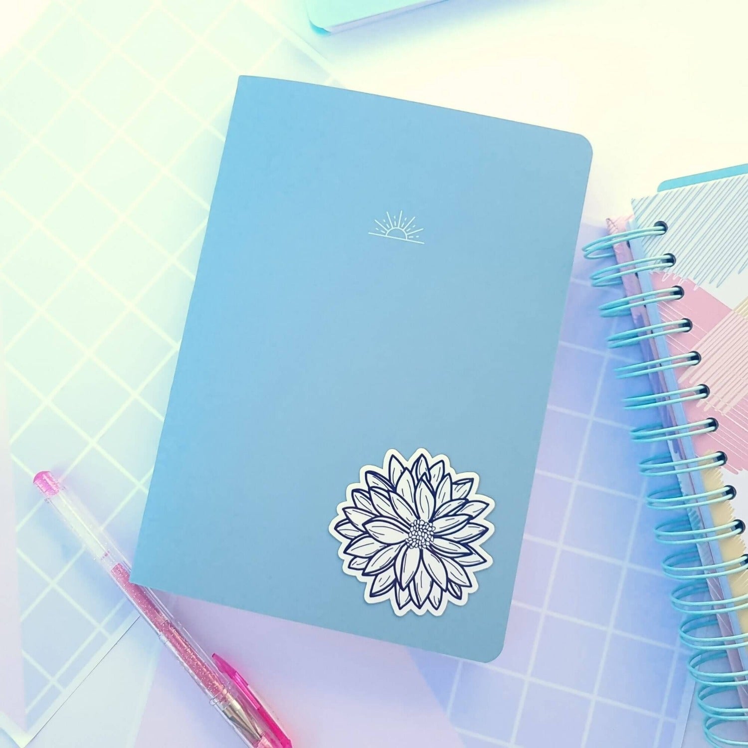 daisy flower vinyl sticker on a notebook