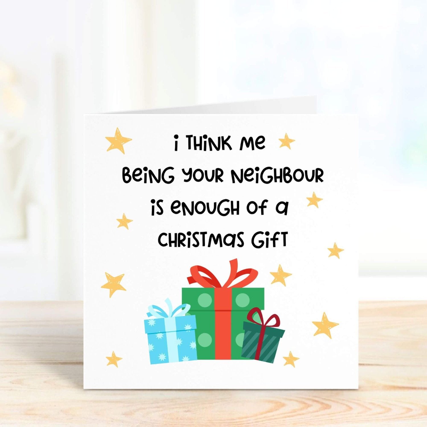 Humorous Christmas card for a neighbour featuring colourful presents and stars, with a funny message that reads, "Me being your neighbour is enough of a Christmas gift."