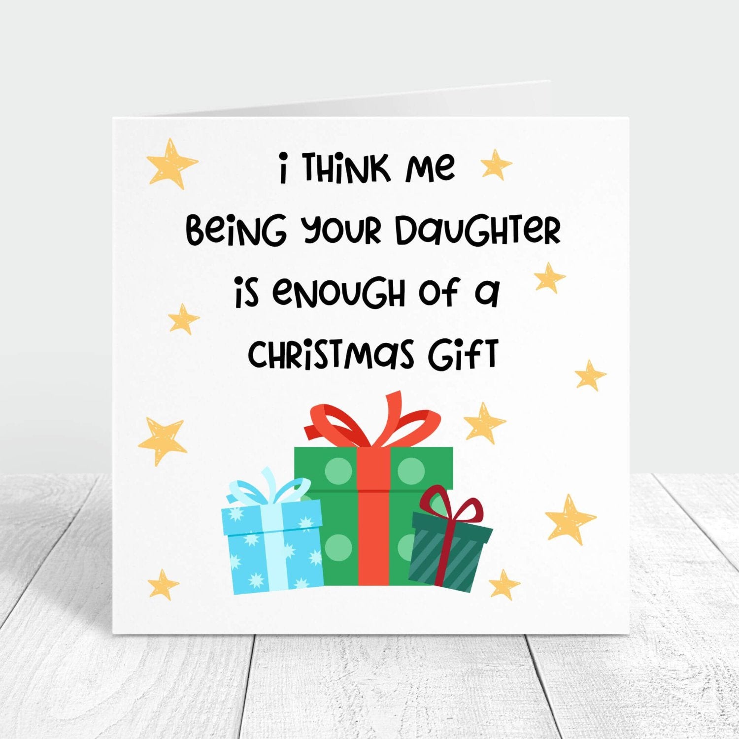 Funny Christmas card with the message "I think me being your daughter is enough of a Christmas gift," decorated with colourful presents and stars. Perfect for sharing a laugh with parents.