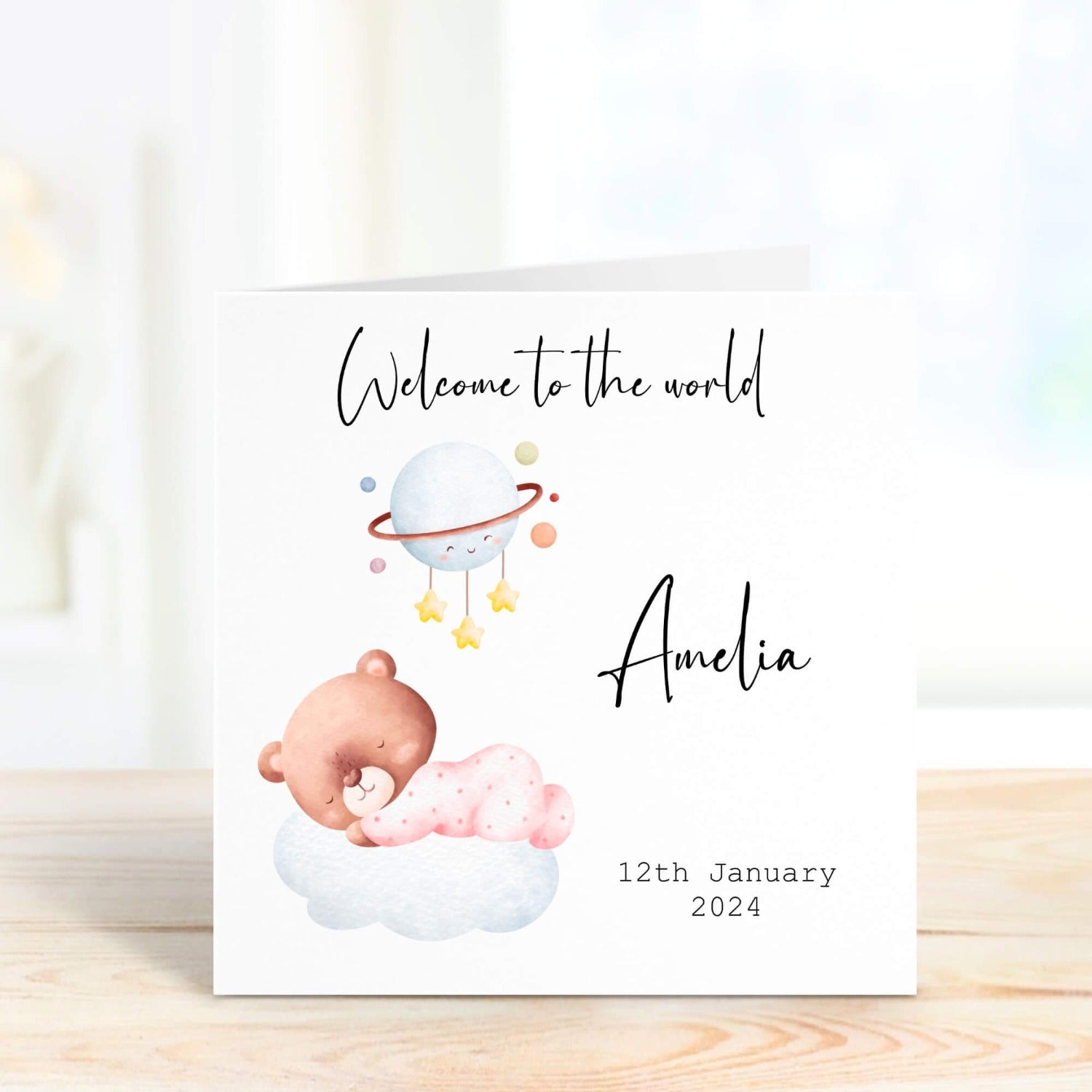 new baby girl card with the message welcome to the world