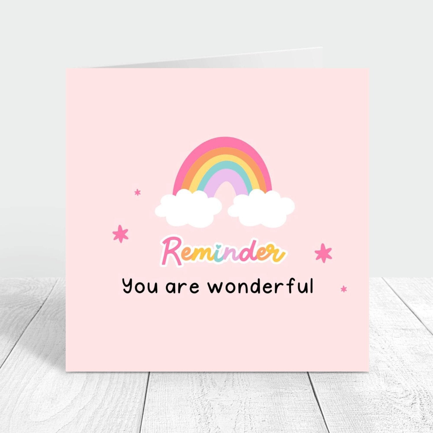 reminder - you are wonderful card with a rainbow design in a pink background