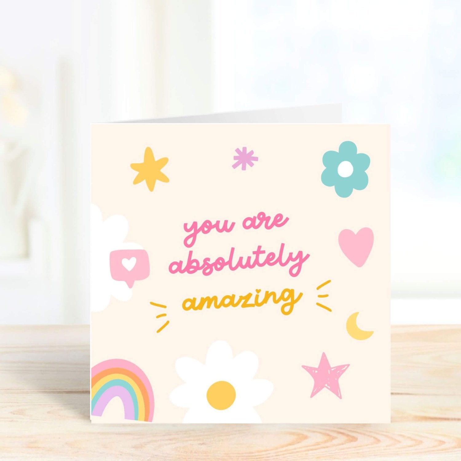 cute card with rainbow and flowers and the quote you are absolutely amazing