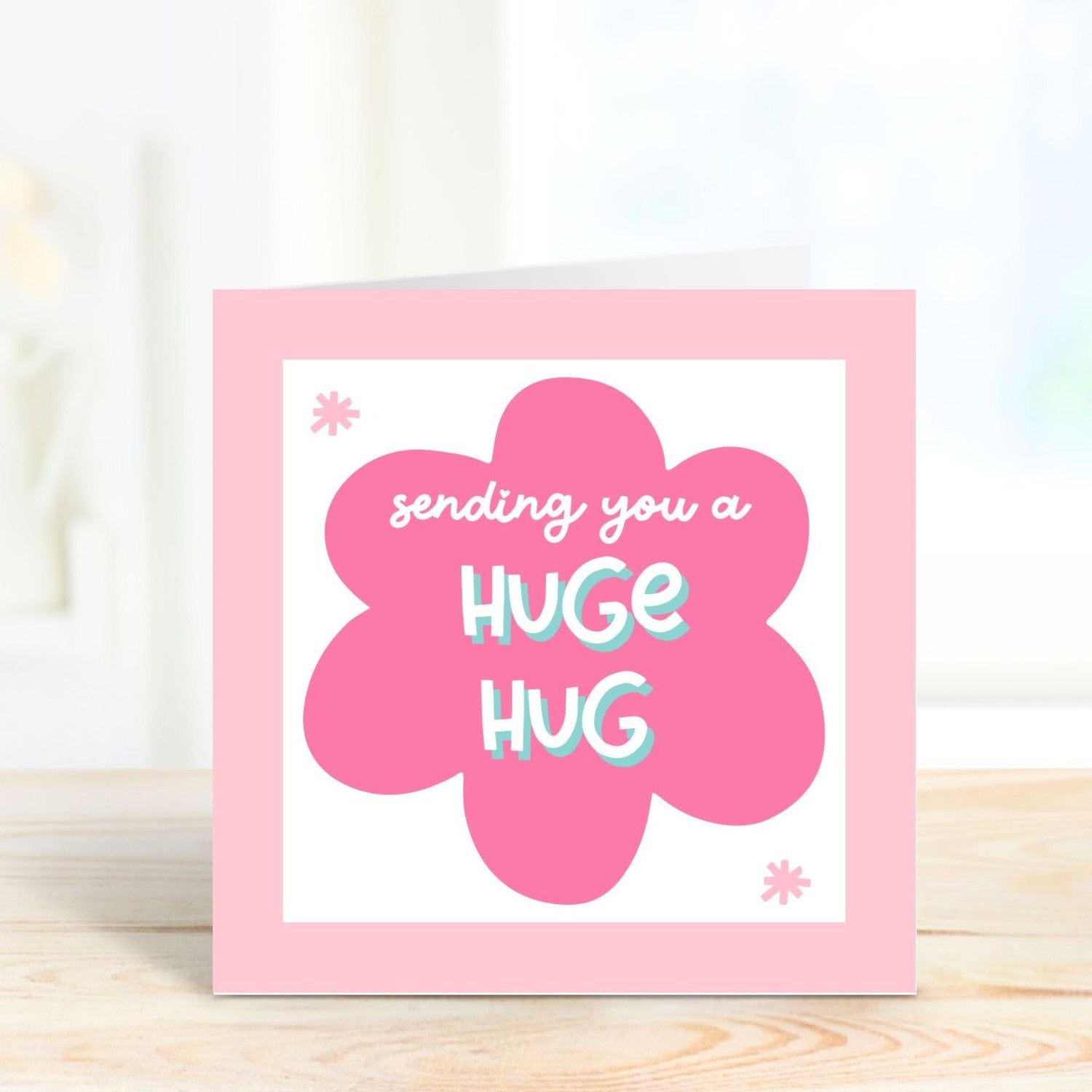 pink thinking of you card sending a hug